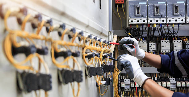 Professional Electrician technician working in Fort Washington, PA